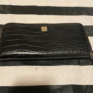 Anne Klein wallet gently used with three cosmetic damages which are posted